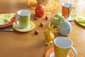 View to a colorful easygoing family breakfast table decorated for Easter