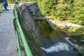 View to Dam on the Lomnica River, semicircular dam with five overflows, on the Lomnica River, in Karpacz, Poland Royalty Free Stock Photo