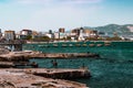 View to the embankment at the sea city Novorossiysk in summer sunny day. Royalty Free Stock Photo