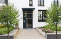 View to entrance door of a modern residential building with new apartments in the city Royalty Free Stock Photo