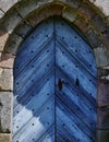 View to the entrance of a medieval village church in Germany