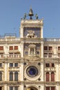 View to famous clock tower with hammering men at St. Mark`s square in Venice, Italy Royalty Free Stock Photo