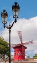 View to the famous Parisian landmark - Moulin Rouge