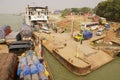 View to the ferry pier from the arriving ferry boat in Chhota Dhulandi, Bangladesh.