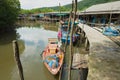 View to the fishermen`s village with stilt residential houses and fishing boats in Koh Chang, Thailand. Royalty Free Stock Photo