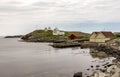 A view to Fjoloy lighthouse, watcher house and jetty
