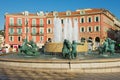 View to the Fontaine du Soleil at the Place Massena square on a hot day in Nice, France. Royalty Free Stock Photo