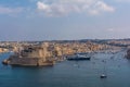 View to the Fort St. Angelo, with part of the city Birgu Vittoriosa, and to the Grand Harbour Marina full with luxury yachts