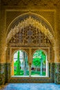 A view to a garden through arched windows. Alhambra Palace, Granada, Andalucia, Spain....IMAGE Royalty Free Stock Photo