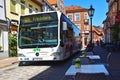 View to the German medieval town of Lueneburg. A public bus tortures itself through the narrow alley Royalty Free Stock Photo
