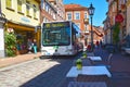 View to the German medieval town of Lueneburg. You see  a public bus tortures itself through the narrow alley Royalty Free Stock Photo