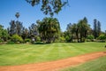 A view to Government House lawn park and landscaped gardens in Perth City Royalty Free Stock Photo