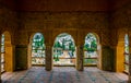 A view to Granada through arched windows. Alhambra Palace, Granada, Andalucia, Spain....IMAGE Royalty Free Stock Photo