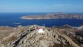 View to the historic small chapel with red roof overlooking the shores of Mykonos Island, Greece