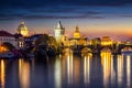 View to the illuminated Charles Bridge and Old Town of Prague, Czech Republic, during night time