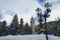 View to the inclining bell tower at the ski resort town of St. Moritz, Engadine valley, Switzerland.