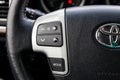 View to the interior of Toyota Land Cruiser 200 with dashboard, clock, media system, front seats, brown leather and shiftgear Royalty Free Stock Photo