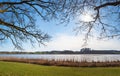 view to lake Egglburger See near Ebersberg, bare oak tree branches Royalty Free Stock Photo