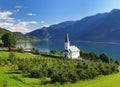 View To Lustrafjord With A White Wooden Chapel In The Foreground In Hoyheimsvik Royalty Free Stock Photo