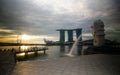 view to Merlion statue at merlion park in marina bay area with background of many skyscraper business financial building in Royalty Free Stock Photo