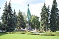 The monument against the background church