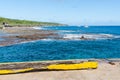 View to moored yachts beyond reef , Niue.