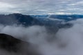 View to the mountains covered by clouds