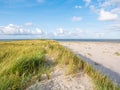 View to North Sea from dunes with marram grass and beach of nature reserve Boschplaat on Terschelling, Netherlands Royalty Free Stock Photo