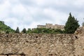 View to old stone wall and Despot palace in abandoned medieval town Mystras, Greece