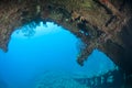 View to the outside from within a shipwreck.