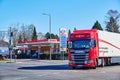 View to the price board of an Esso Group gas station with extremely high prices and a truck in the foreground Royalty Free Stock Photo