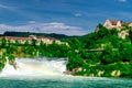 View to Rhine falls Rheinfalls , the largest plain waterfall in Europe. It is located near the town of Schaffhausen in Royalty Free Stock Photo
