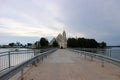 View to the road and entrance gate of Nilov Monastery on Stolobny Island, lake Seliger, Ostashkov, Russia Royalty Free Stock Photo