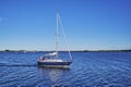 View to a sailing boat at the Greifswalder Bodden at the Baltic Sea