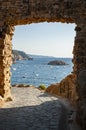 View to the sea and The Punta de Sa Llonga coast from the Old Town of Tossa de Mar, Catalonia, Spain Royalty Free Stock Photo