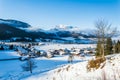 View to a snowy village  and beautiful winter landscape in the German Alpson a sunny winter day Royalty Free Stock Photo