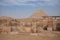 View to Step pyramid of Djoser in Saqqara from pyramid of Unas, an archeological remain in the Saqqara necropolis, Egypt Royalty Free Stock Photo