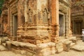 View to the stone carving at the walls of the ruins of the Preah Ko Temple in Siem Reap, Cambodia. Royalty Free Stock Photo