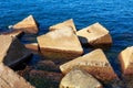 View to the stones on the Mediterranean coast on a sunny day