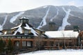 View to the Stowe Mountain Ski Resort lodge and peak Mansfield slopes from  Spruce peak in mid December Royalty Free Stock Photo