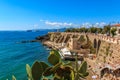 View of the terrace Giovanni Bovio and the lighthouse of Rocchetta in Piombino, Tuscany, Italy, in the background Elba Island Royalty Free Stock Photo