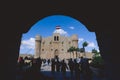 View to the 15th-century defensive fortress Citadel of Qaitbay with many Tourists, located on the Mediterranean sea coast Royalty Free Stock Photo