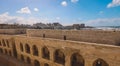 View to the 15th-century defensive fortress Citadel of Qaitbay with no people around, located on the Mediterranean sea coast, in A Royalty Free Stock Photo