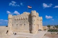 View to the 15th-century defensive fortress Citadel of Qaitbay with no people around, located on the Mediterranean sea coast, in A Royalty Free Stock Photo