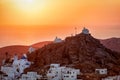 View to tha famous churches above the town of Ios island, Greece, during sunset Royalty Free Stock Photo