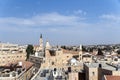 View to the tiled roofs architecture of old city of Jerusalem at blue sky background