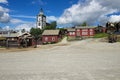 View to the traditional wooden houses and church bell tower of the copper mines town of Roros in Roros, Norway.