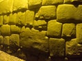 View to Twelve-angled stone aka Hatun Rumiyoc as a part of a wall of the palace of the Archbishop of Cuzco, Peru