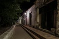 View to typical one story buildings at night in light of lanterns at the promenade of, Santa Cruz de Mompox, Colombia, World Royalty Free Stock Photo