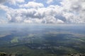 View to the valley with villages, small towns, forest and fields under blue sky with clouds. High Tatras Slovakia Royalty Free Stock Photo